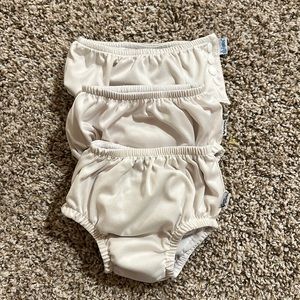 3 3T Swim Diapers, 1 is a button up (iplay) and 2 are pull up (green sprouts)